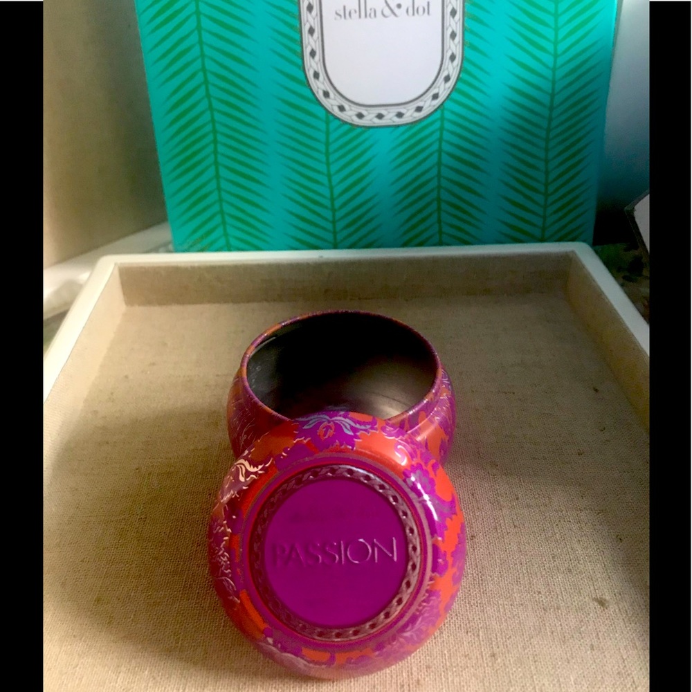 Empty candle tin for storage